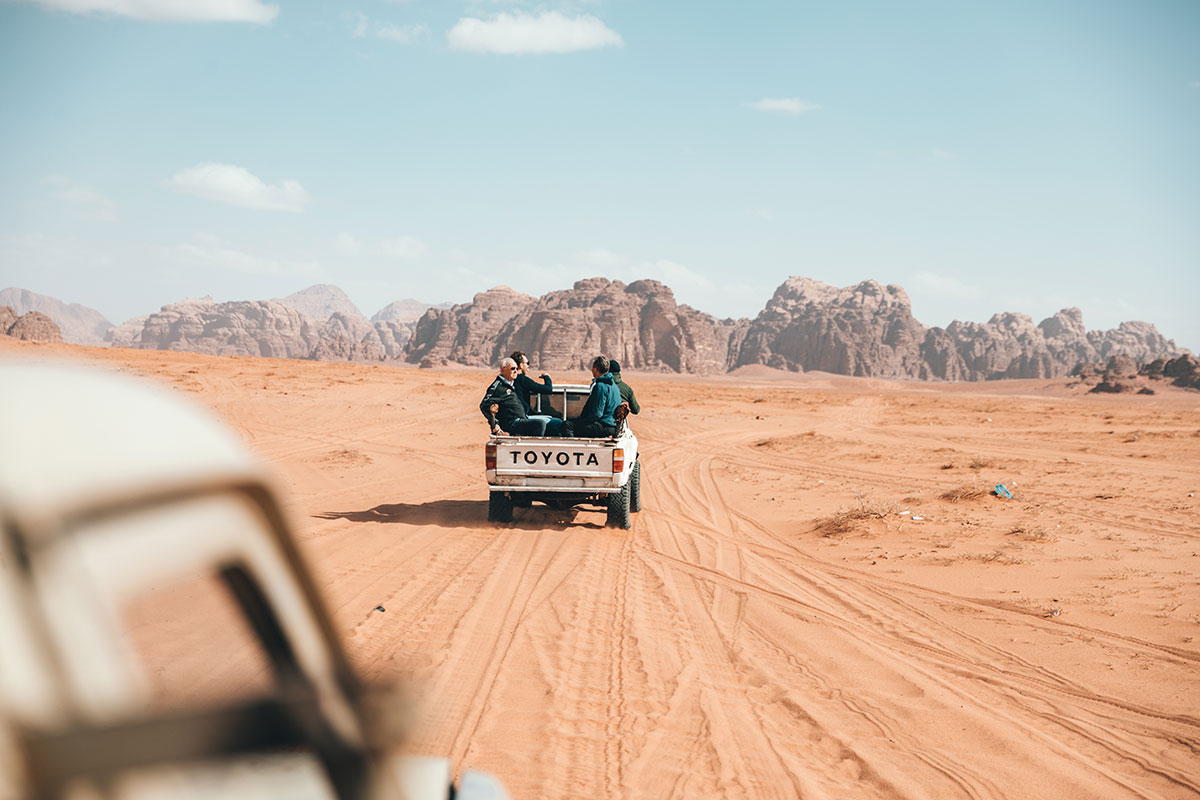 photo-of-people-riding-on-pickup-truck-4388158